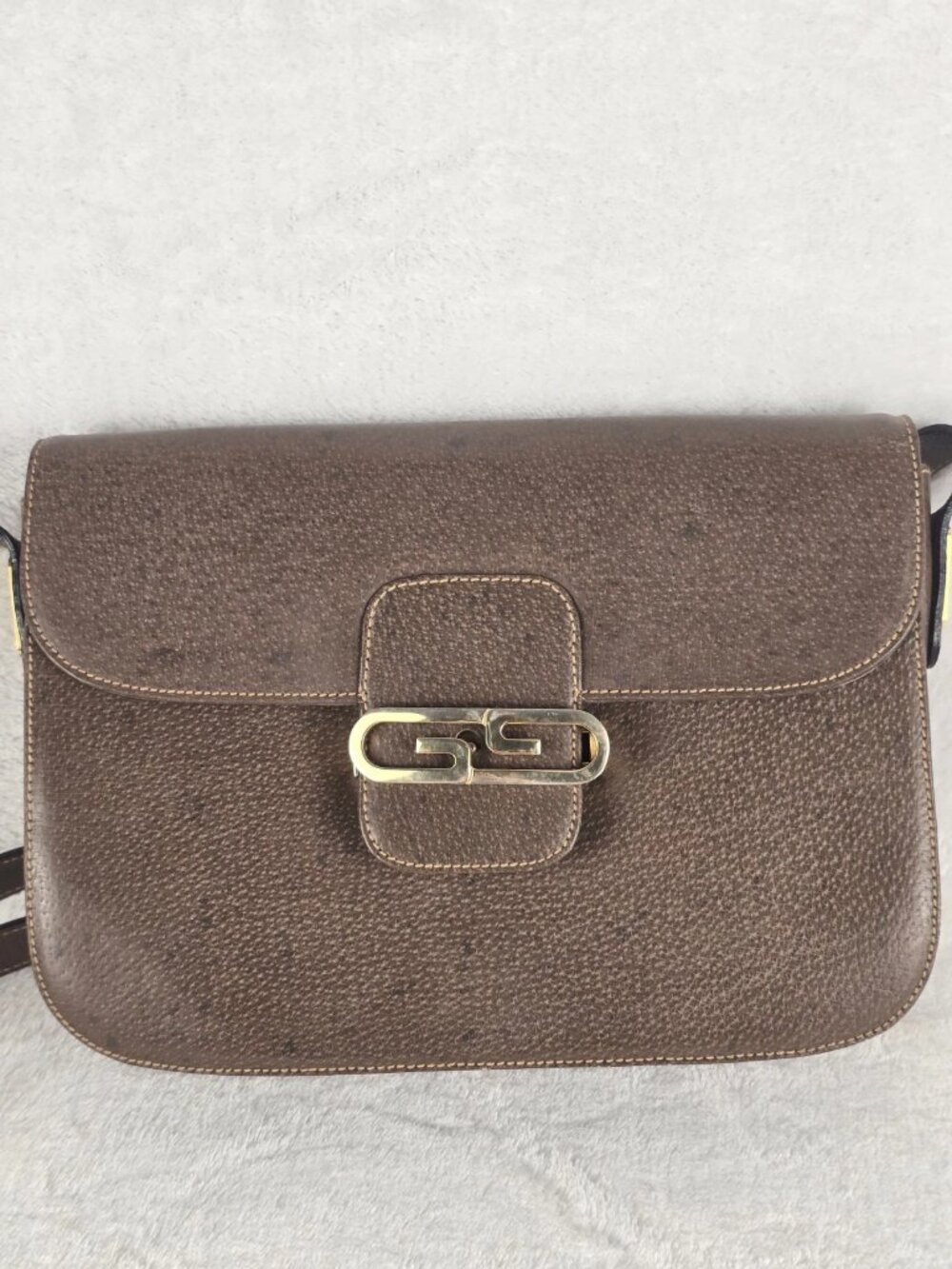 Rare Vintage 1973 Gucci Brown Leather Flap Shoulder Bag with adjustable strap.